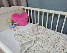 Load image into Gallery viewer, Thin muslin blanket in white with soft pink flowers and white pom pom ball ribbon