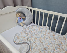 Load image into Gallery viewer, Light muslin blanket with balls and gray pom pom ball ribbon