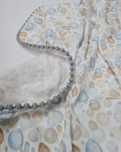 Load image into Gallery viewer, Light muslin blanket with balls and gray pom pom ball ribbon