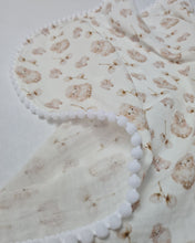 Load image into Gallery viewer, Thin muslin blanket in a light shade with lambswool and white pom pom ball ribbon