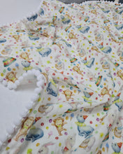 Load image into Gallery viewer, Thin muslin blanket in white with animals and white pom pom ball ribbon