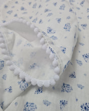 Load image into Gallery viewer, Thin muslin blanket in white with blue dots and white pom pom ribbon