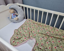 Load image into Gallery viewer, Thin muslin blanket in a green shade with rose flowers and a ribbon of pink pom pom balls