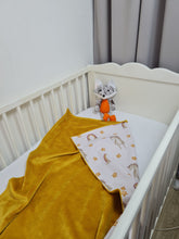 Load image into Gallery viewer, Minky blanket in yellow smooth fabric with horses and stars on a white background