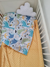 Load image into Gallery viewer, Minky blanket in yellow with large colorful dinosaurs