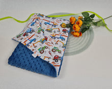 Load image into Gallery viewer, Minky blanket blue with cars and tractors on a white background