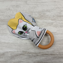 Load image into Gallery viewer, A snack ring with headphones
