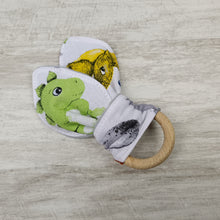 Load image into Gallery viewer, A snack ring with headphones