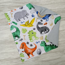 Load image into Gallery viewer, Teddy bear with dinosaurs
