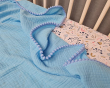 Load image into Gallery viewer, Thin muslin blanket in blue tone solid and pom pom ball ribbon
