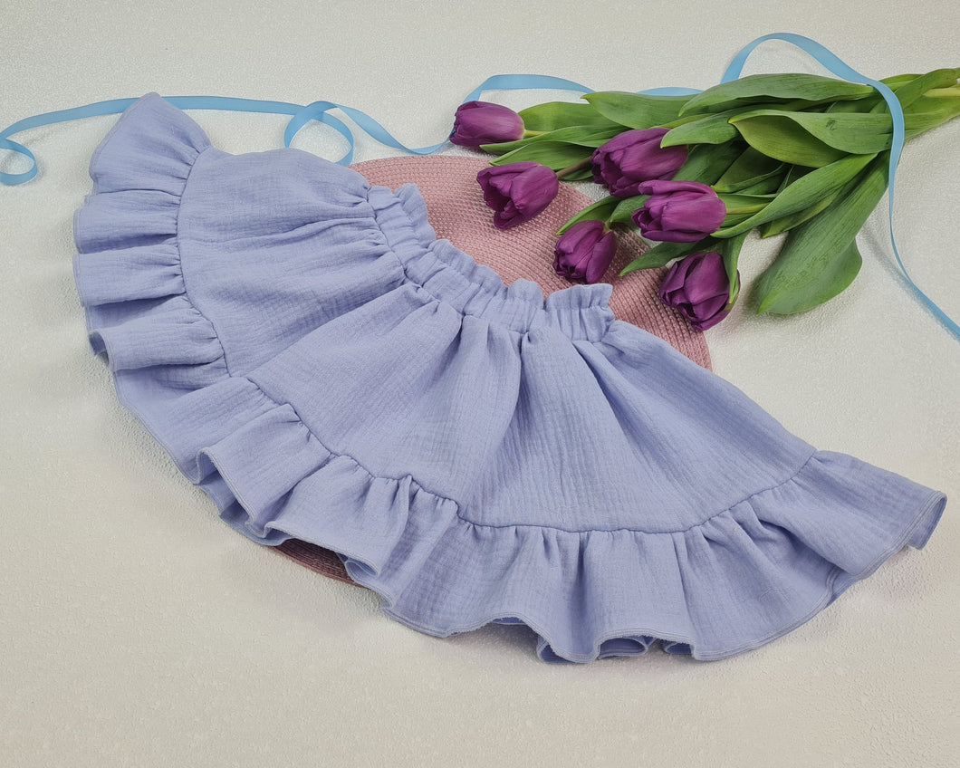 Girls' skirt with a frill made of muslin fabric in a purple tone